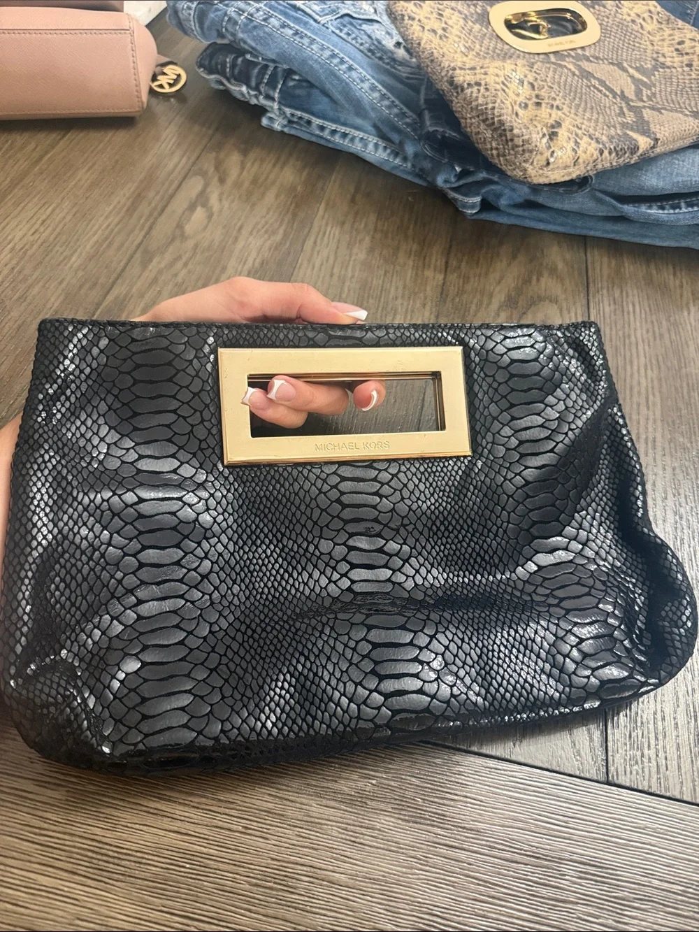 Michael Kors Black Snake-Embossed Leather Clutch with Gold-Tone Cutout Handle